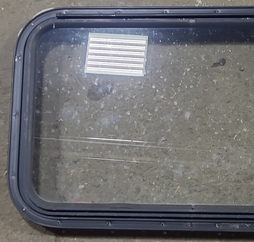 Used Black Radius Emergency Opening Window : 30 3/4" W x 18 3/4" H x 1 5/8" D - Young Farts RV Parts