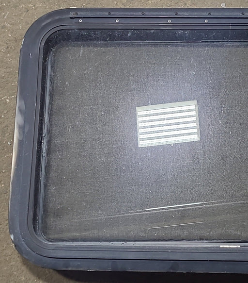 Used Black Radius Emergency Opening Window : 35 3/8" W x 21 3/8" H x 1 5/8" D - Young Farts RV Parts