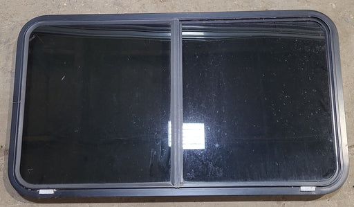 Used Black Radius Opening Window : 45 1/4" W x 25 1/2" H x 1 7/8" D - Young Farts RV Parts