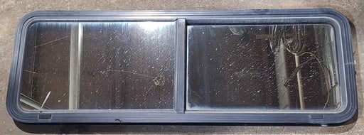 Used Black Radius Opening Window : 54" W x 17 1/2" H x 2" D - Young Farts RV Parts