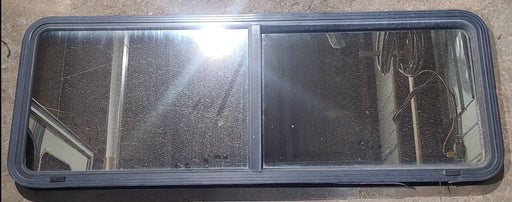 Used Black Radius Opening Window : 60" W x 21 1/2" H x 2" D - Young Farts RV Parts