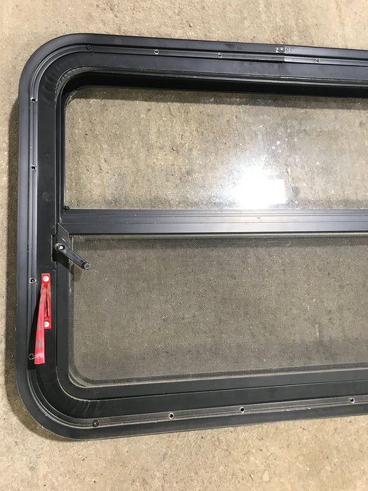 Used Black Radius Emergency Opening Window : 29 1/2" W x 21 1/2" H x 1 7/8" D