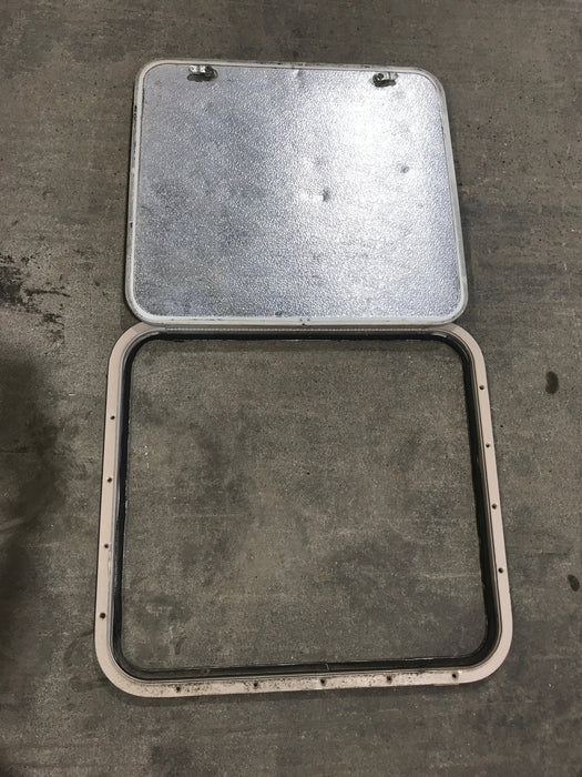 Used Radius Corner cargo door  23 3/4" W  x 21 3/4" H x  1/2" D