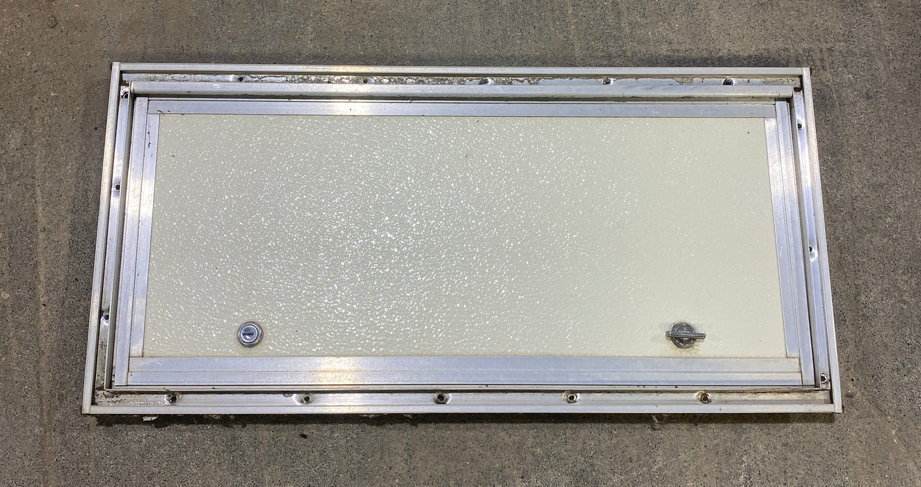 Used Square Cornered Cargo Door 23 1/2" W x 10 1/2" H X 1" D