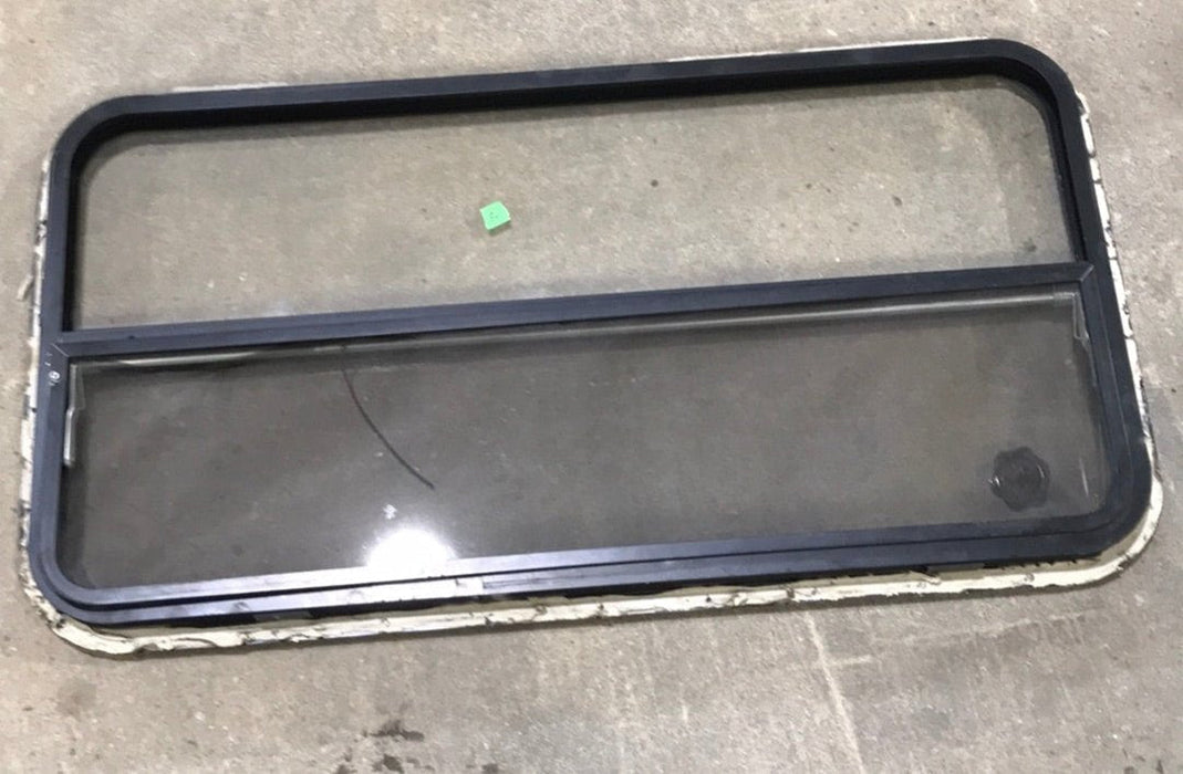 USED Black Radius Opening Window : 42 1/2" W x 22 1/2" H x 2" D - Young Farts RV Parts