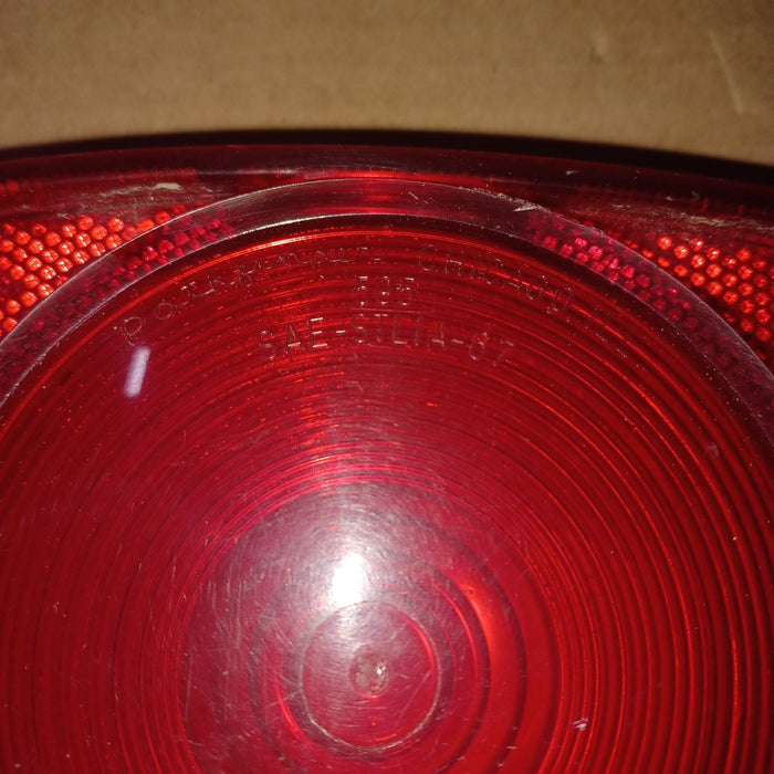 Used 595 SAE-STLIA-67 Tail Light Replacement Lens