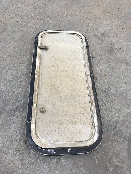 Used Radius Cargo / compartment Door 23 3/4" W x 9 3/4" H