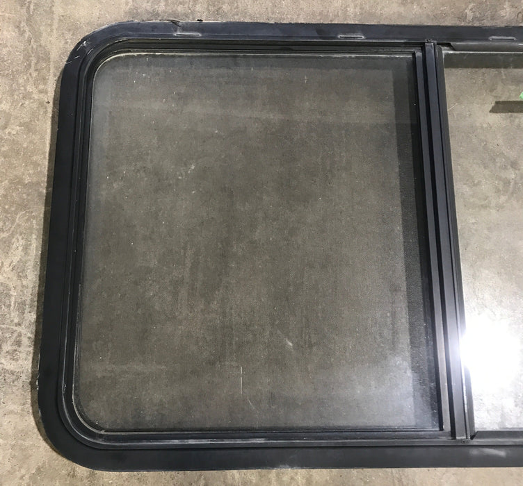 Used Black Radius Opening Window : 45 1/2" W x 25 1/2" H x 2" D - Young Farts RV Parts
