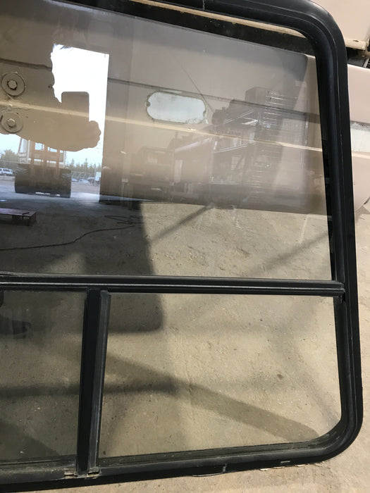 Used Slanted Black Radius Opening Window : 41 1/4" W x 33 3/4" H x 2" D - Young Farts RV Parts