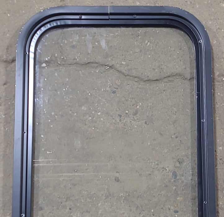 Used Black Radius Non Opening Window : 17 1/2" W x 31 3/4" H x 1 1/2" D