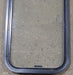 Used Black Radius Non Opening Window : 17 1/2" W x 31 3/4" H x 1 1/2" D - Young Farts RV Parts