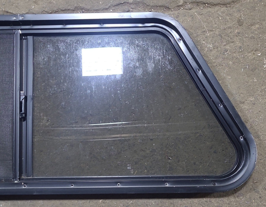 Used Slanted Black Radius Opening Window : 41 3/4" W x 17 3/4" H x 1 7/8" D - Young Farts RV Parts