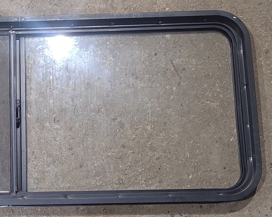 Used Black Radius Opening Window : 54 1/4" W x 21 3/4" H x 1 7/8" D