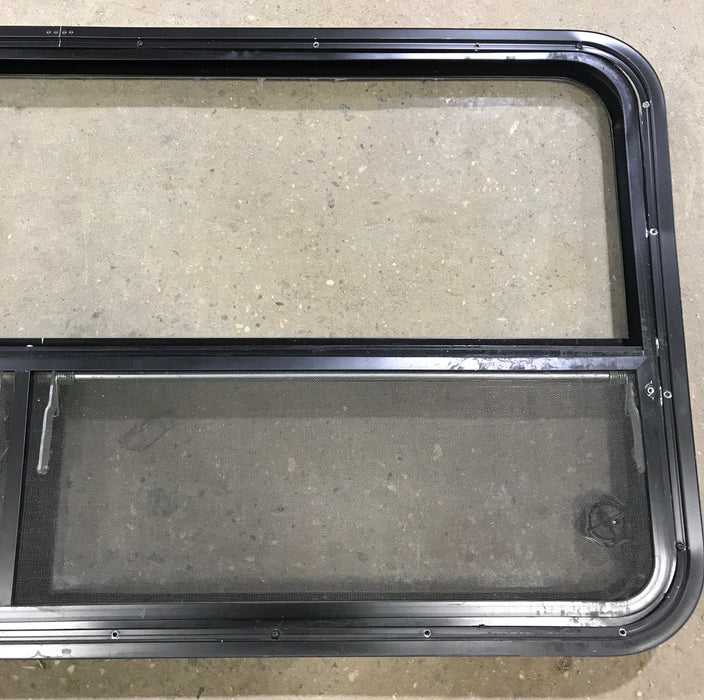 Used Black Radius Window : 53 1/4" W x 25 1/4" H x 2 1/4" D