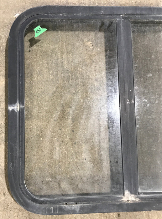 Used Black Radius Opening Window : 24 1/2" W x 21 1/2" H x 1 7/8" D
