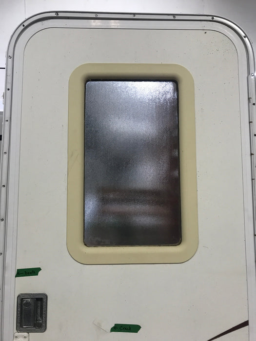 Drafted to hold tor customer Used RV Radius Corner Entry Door 30" W x 72" H