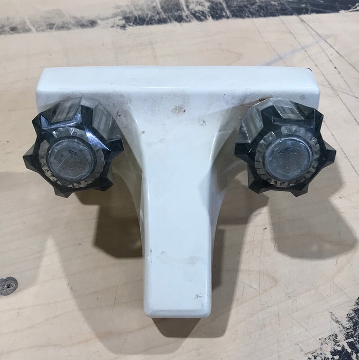 Used 4" Bathroom Faucet, Off White, Smoked Knobs