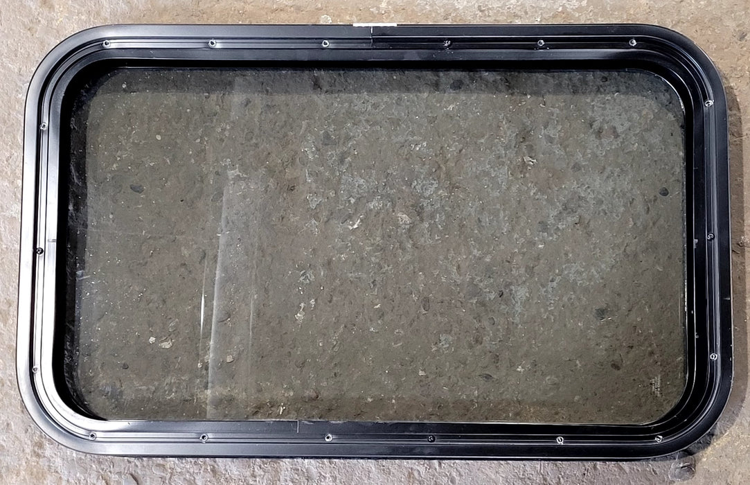 Used Black Radius Non Opening Window : 29 1/2" W x 17 1/2" H x 1 7/8" D