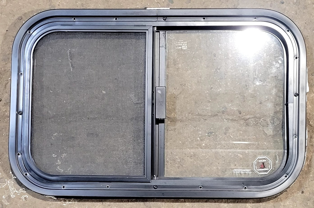 Used Black Radius Opening Window : 23 1/4" W x 14 1/4" H x 1 1/4" D - Young Farts RV Parts