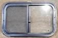 Used Black Radius Opening Window : 23 1/4" W x 14 1/4" H x 1 1/4" D - Young Farts RV Parts