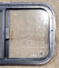 Used Black Radius Opening Window : 23 1/4" W x 14 1/4" H x 1 1/4" D - Young Farts RV Parts