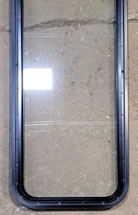 Used Black Radius Non Opening Window : 17 1/4" W x 47 1/4" H x 1" D - Young Farts RV Parts
