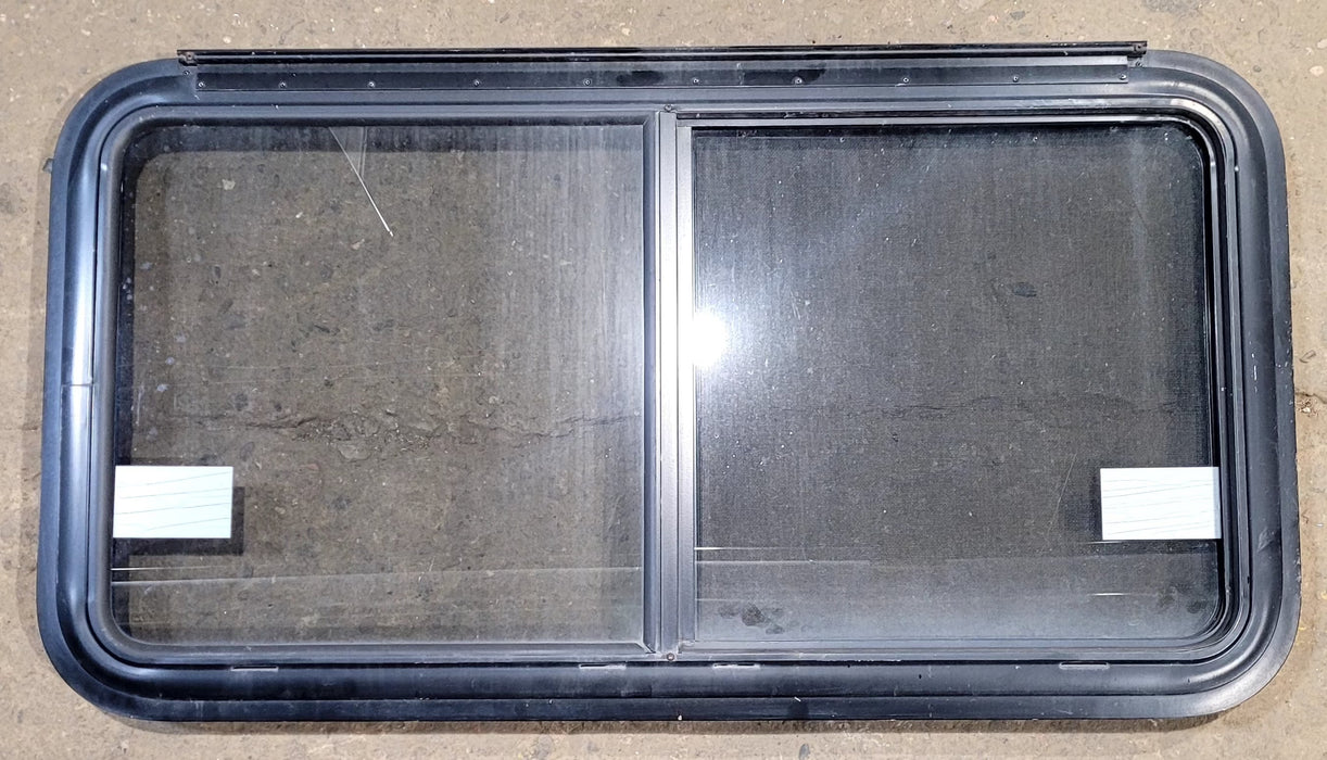 Used Black Radius Emergency Opening Window : 41 1/4" W x 21 1/2" H x 1 1/4" D - Young Farts RV Parts