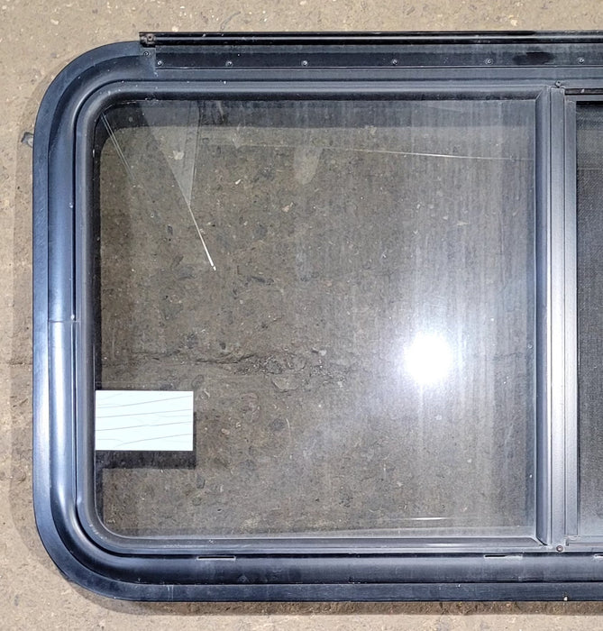 Used Black Radius Emergency Opening Window : 41 1/4" W x 21 1/2" H x 1 1/4" D - Young Farts RV Parts
