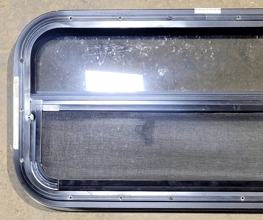Used Black Radius Opening Window : 29 1/4" W x 14 1/2" H x 1 1/4" D - Young Farts RV Parts