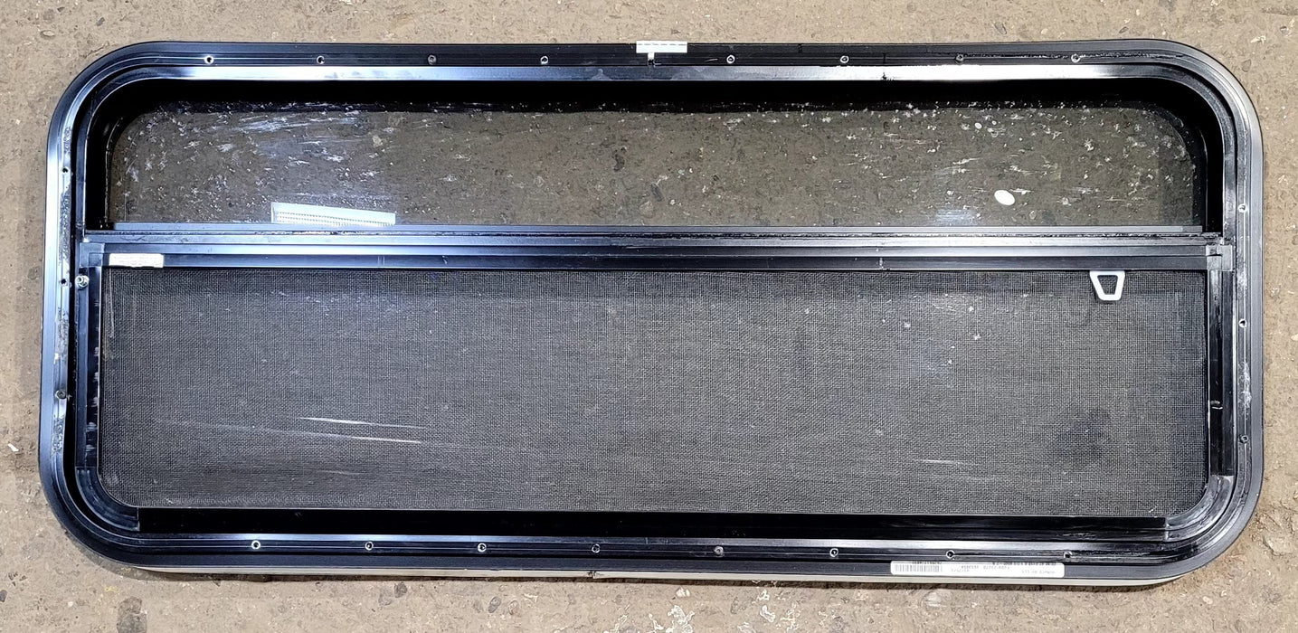 Used Black Radius Opening Window : 41 1/4" W x 17 1/4" H x 1 1/8" D - Young Farts RV Parts