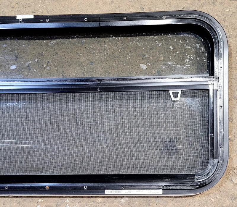 Used Black Radius Opening Window : 41 1/4" W x 17 1/4" H x 1 1/8" D - Young Farts RV Parts