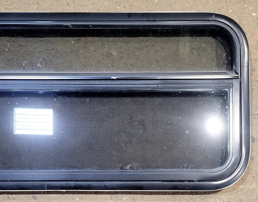 Used Black Radius Opening Window : 41 1/4" W x 17 1/4" H x 1 1/8" D - Young Farts RV Parts