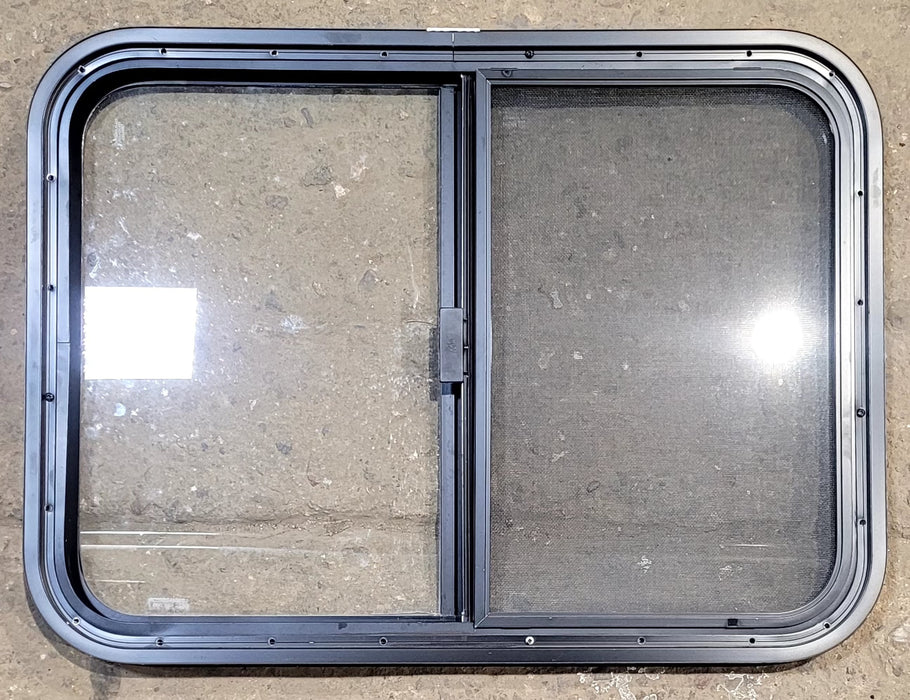 Used Black Radius Opening Window : 29 1/4" W x 21 1/4" H x 1 1/4" D - Young Farts RV Parts