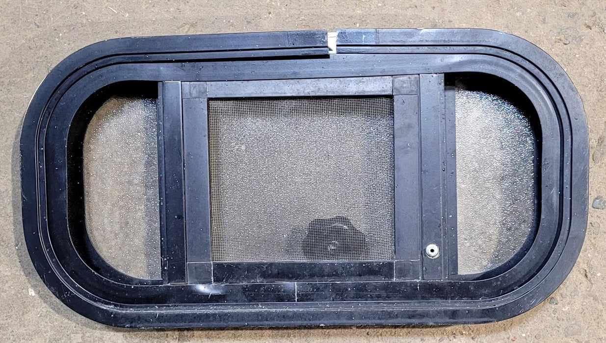 Used Black Radius Opening Window : 18 1/2" W x 9 1/2" H x 1 5/8" D - Young Farts RV Parts