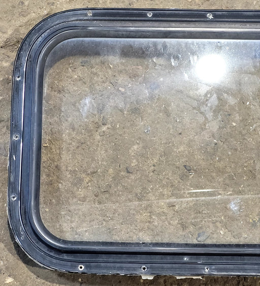 Used Black Radius Non Opening Window : 25" W x 16 3/4" H x 1 5/8" D - Young Farts RV Parts