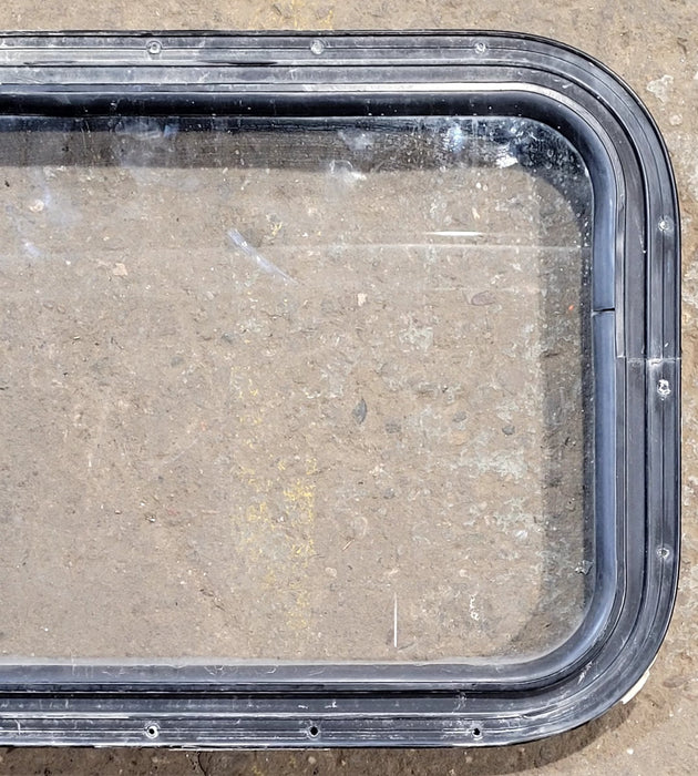 Used Black Radius Non Opening Window : 25" W x 16 3/4" H x 1 5/8" D - Young Farts RV Parts