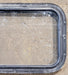 Used Black Radius Non Opening Window : 25" W x 16 3/4" H x 1 5/8" D - Young Farts RV Parts