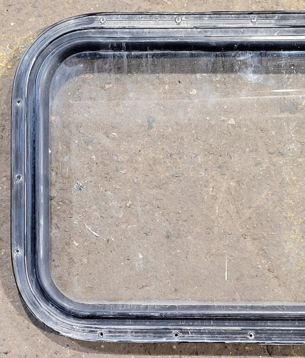 Used Black Radius Non Opening Window : 25" W x 16 3/4" H x 1 5/8" D - Young Farts RV Parts