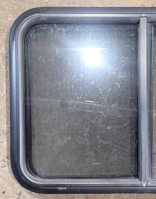 Used Black Radius Opening Window : 29 3/4" W x 19 3/4" H x 1 7/8" D - Young Farts RV Parts