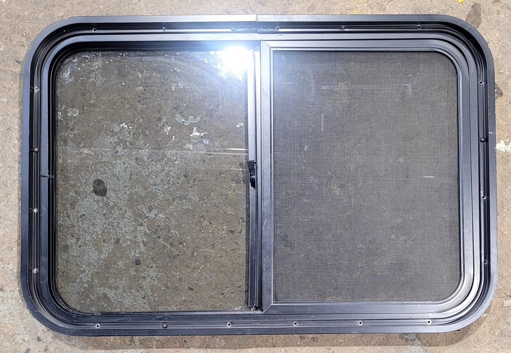 Used Black Radius Opening Window : 29 3/4" W x 19 3/4" H x 1 7/8" D - Young Farts RV Parts