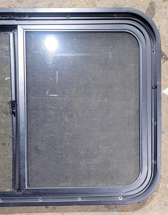 Used Black Radius Opening Window : 29 3/4" W x 19 3/4" H x 1 7/8" D - Young Farts RV Parts