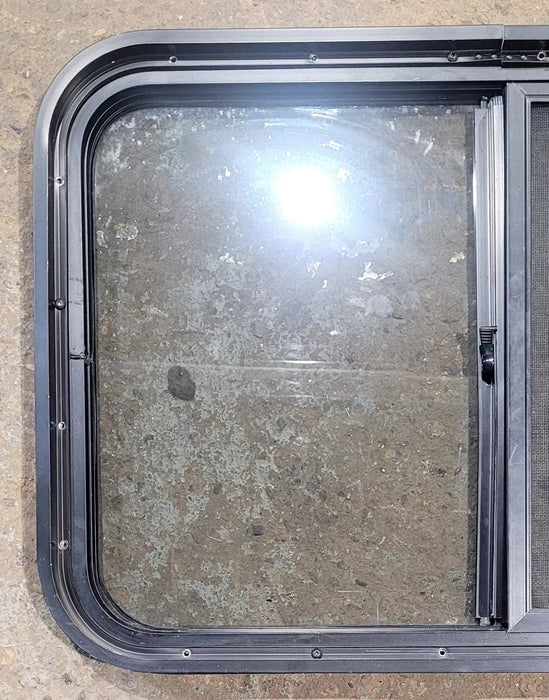 Used Black Radius Opening Window : 29 3/4" W x 19 3/4" H x 1 7/8" D - Young Farts RV Parts