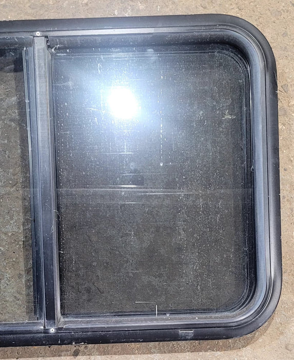 Used Black Radius Opening Window : 29 3/4" W x 19 3/4" H x 1 3/4" D - Young Farts RV Parts