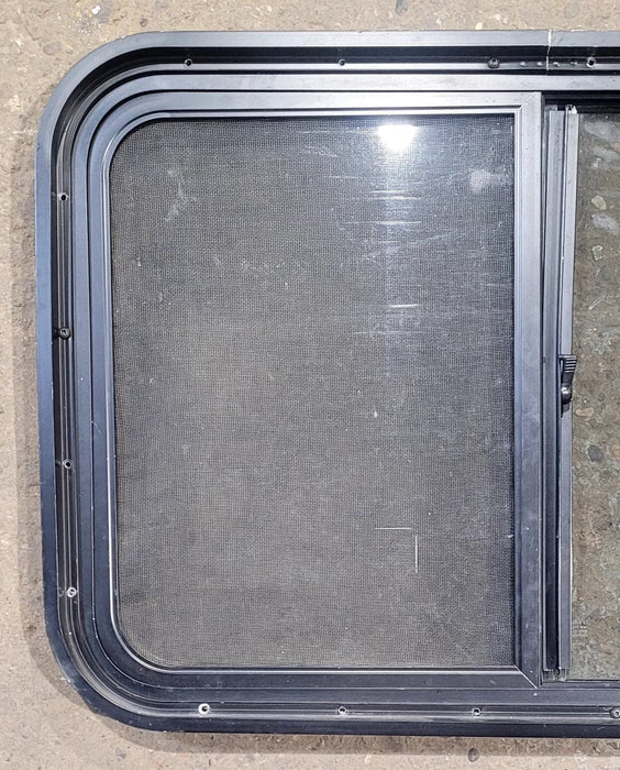 Used Black Radius Opening Window : 29 3/4" W x 19 3/4" H x 1 3/4" D - Young Farts RV Parts
