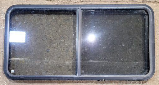 Used Black Radius Opening Window : 47 3/4" W x 23 3/4" H x 1 7/8" D - Young Farts RV Parts