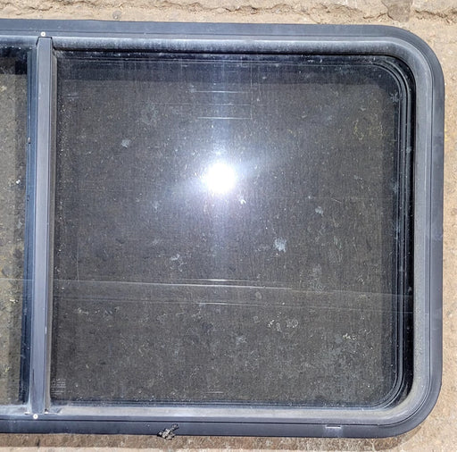 Used Black Radius Opening Window : 47 3/4" W x 23 3/4" H x 1 7/8" D - Young Farts RV Parts