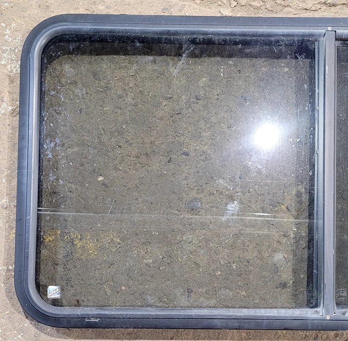 Used Black Radius Opening Window : 47 3/4" W x 23 3/4" H x 1 7/8" D - Young Farts RV Parts