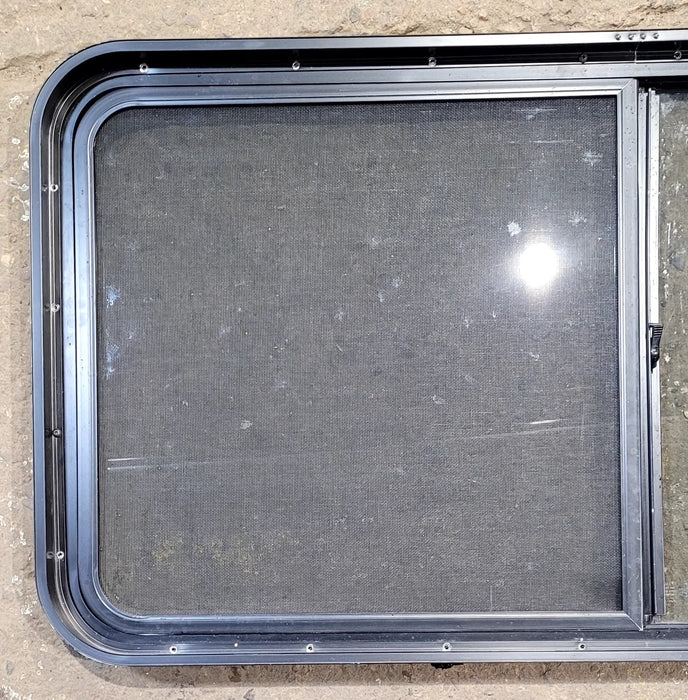Used Black Radius Opening Window : 47 3/4" W x 23 3/4" H x 1 7/8" D - Young Farts RV Parts