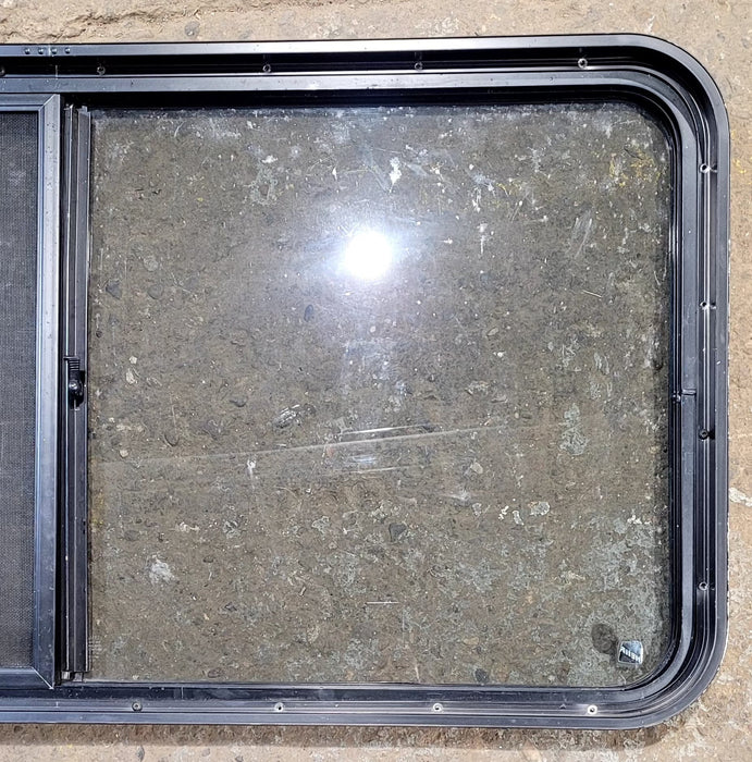 Used Black Radius Opening Window : 47 3/4" W x 23 3/4" H x 1 7/8" D - Young Farts RV Parts