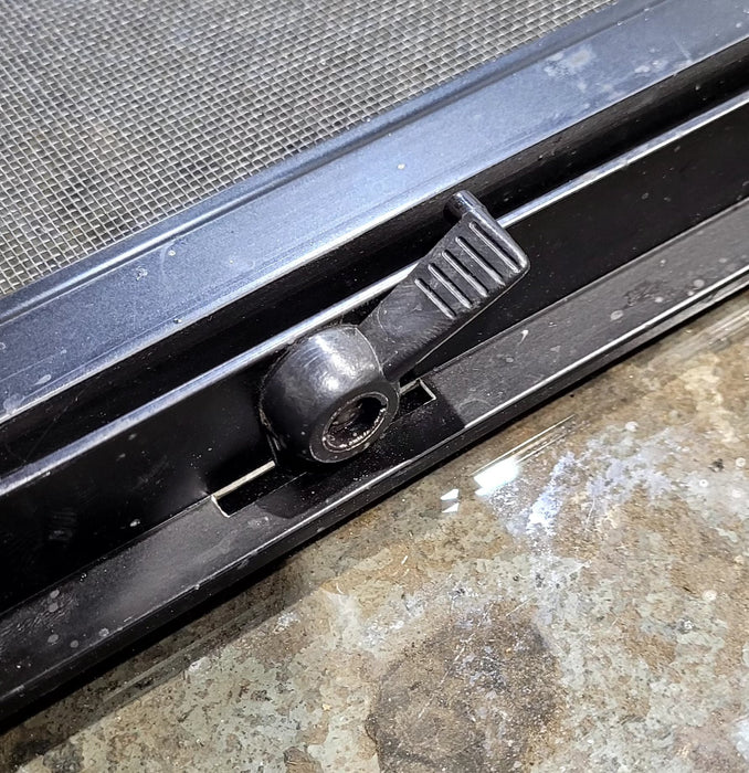 Used Black Radius Opening Window : 47 3/4" W x 23 3/4" H x 1 7/8" D - Young Farts RV Parts